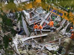 البحث عن عشرات المفقودين تحت أكوام النفايات بالفلبين